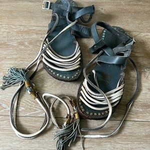 Free people gray sandals with tassels